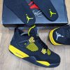 Nike Air Jordan 4 Retro Black Yellow Sneakers