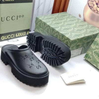 Gucci Rubber Clogs Black GG Embossed Platform Sole